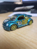 2007 Hot Wheels Pop-Offs Teal Volkswagen Beetle Cup Race Car w/Yellow Spokes