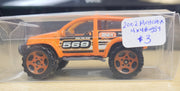 2002 Matchbox Thailand 4x4 Buggy Tech Team MBX 569 Orange Die-Cast Car W/ Case