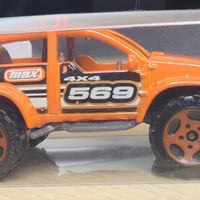 2002 Matchbox Thailand 4x4 Buggy Tech Team MBX 569 Orange Die-Cast Car W/ Case