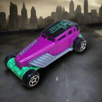 2016 McDonalds DC Universe Hot Wheels Joker Purple/Green Pullback Plastic Car