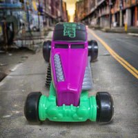 2016 McDonalds DC Universe Hot Wheels Joker Purple/Green Pullback Plastic Car