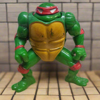 2011 Playmates TMNT Teenage Mutant Ninja Turtles Head Dropping Raphael Figure
