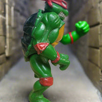 2011 Playmates TMNT Teenage Mutant Ninja Turtles Head Dropping Raphael Figure
