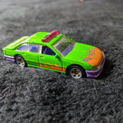 1989 Hot Wheels Heat Fleet Series #1 of 4 - Green/Purple Police Cruiser Die-Cast