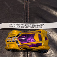 2002 Hot Wheels Malaysia Sinistra Gold w/Purple Windows Version